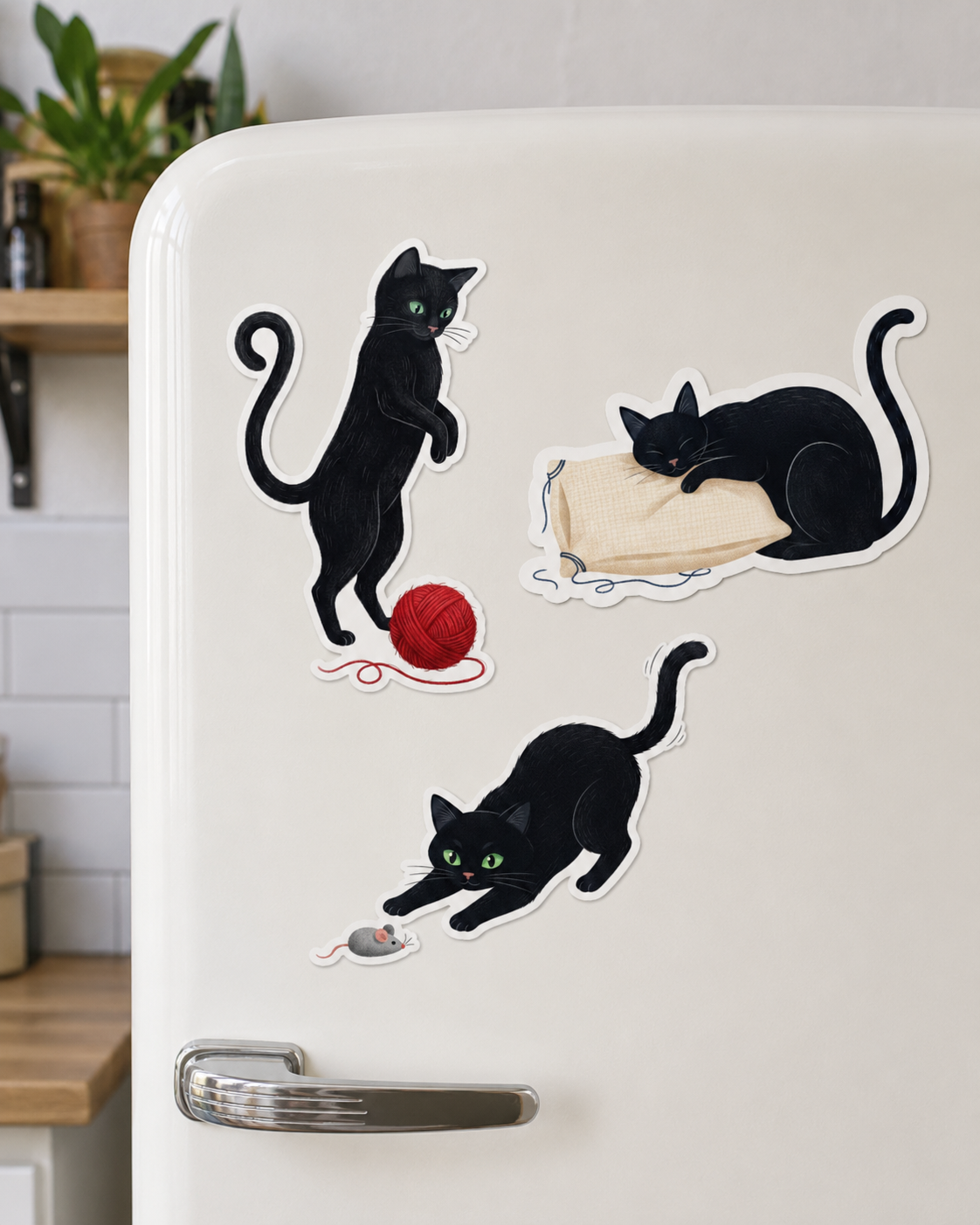 Fridge with black cat-themed stickers