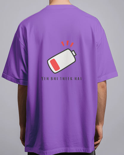 Purple t-shirt with a battery icon and text on the back, worn by a person.